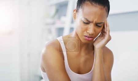 Photo for Black woman, hand and headache pain in home for pressure tension with vertigo, brain fog or migraine. Female person, stress and inflammation fatigue or anxiety burnout with tired, overworked or sick. - Royalty Free Image
