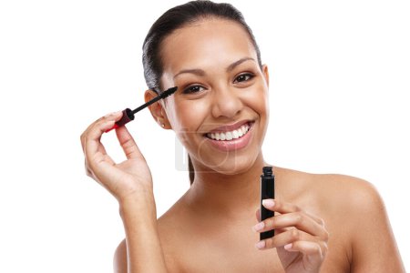 Photo for Face, mascara for lashes and happy woman with beauty, brush for makeup and tools for volume on white background. Cosmetology, cosmetics product and wand for eyelash, makeover and change in studio. - Royalty Free Image