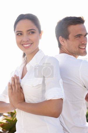 Photo for Smile, prayer pose and couple at yoga retreat with meditation, peace and relax with mindfulness at outdoor resort. Zen, man and woman with holistic health, spiritual wellness and namaste with hands. - Royalty Free Image