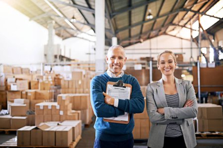 Photo for Boxes, confidence and portrait of business people in warehouse with package, logistics and distribution. Export, commerce and service team at cargo storage factory with clipboard, pride and smile. - Royalty Free Image