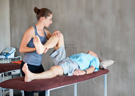 Photo for Physiotherapist, legs and elderly man with physical therapy exercise at rehabilitation center. Medical, help and therapist with senior male patient with consultation for muscle injury at clinic - Royalty Free Image