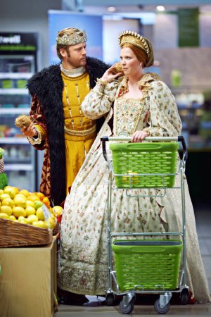 Photo for Confused, supermarket and king with queen, conversation and frustrated with expression and reaction. Royal couple, store and man with woman and decision with inflation and choice with doubt or retail. - Royalty Free Image