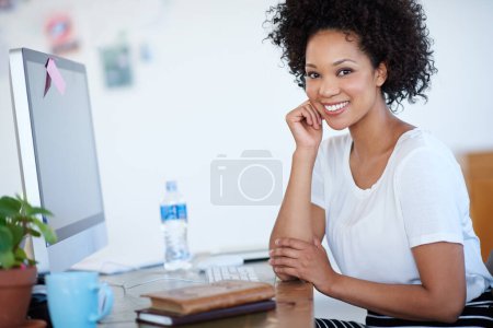 Photo for Young woman, confidence and portrait at computer for creative project, planning or copywriting career. Face of professional editor, writer or African person on desktop at creative or business startup. - Royalty Free Image