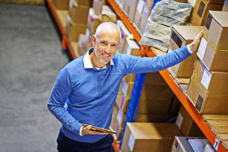 Photo for Tablet, box or portrait of man in warehouse for delivery order label, storage or stock in factory for website. Printing, happy mature manager or supplier inspection for package or wholesale shipping. - Royalty Free Image