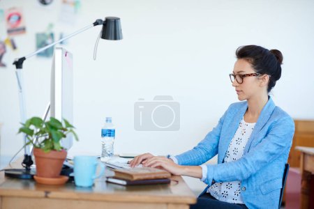 Photo for Business woman, typing and planning on computer for creative project, research and online editing or copywriting. Young professional editor, writer or person on desktop for job or startup newsletter. - Royalty Free Image