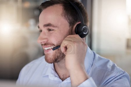 Photo for Smile, call center and man listening on mic for help, tech support or customer service in business office. Headset, telemarketing and professional talking for crm advice, communication or contact us. - Royalty Free Image