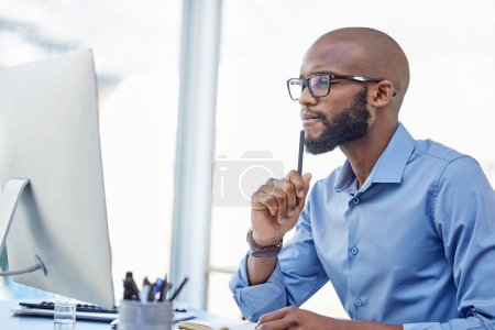 Photo for Computer, thinking and black man in office for planning, problem solving or business agent reading email online. Desktop, idea or serious professional with decision, doubt or inspiration for solution. - Royalty Free Image