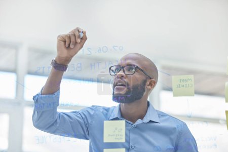 Photo for Black man, board room and employee on glass wall for brainstorming or ideas with sticky notes for business. Project manager, office and task withgoalsl, planning and vision for company growth. - Royalty Free Image