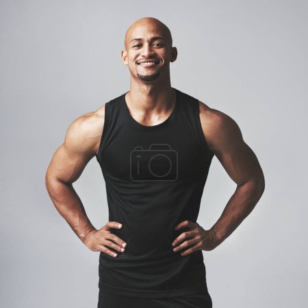 Photo for Portrait, confident or man in fitness, exercise or health as wellness, growth or training in studio. Male person, bodybuilder and smile to start, workout or challenge of strong, power or performance. - Royalty Free Image