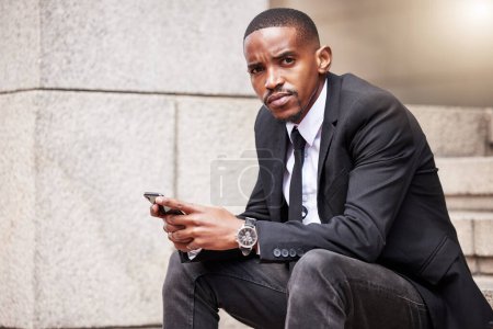 Photo for Businessman, portrait and smartphone or communication in street for career, sitting and typing or email. Male advocate, mobile and text with web for court case in city, chat with technology for legal. - Royalty Free Image