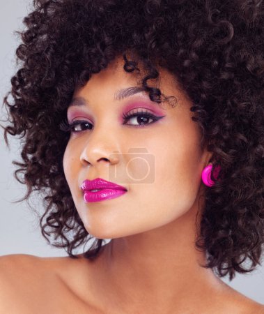 Photo for Makeup, beauty and portrait for woman, haircare and cosmetics on studio background. Cosmetic, face and pink lipstick with curly hairstyle for happy African female model, cosmetology and closeup. - Royalty Free Image