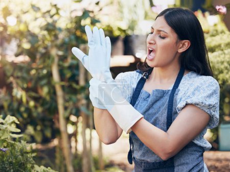Photo for Woman, garden and hands at work in pain with wrist, green entrepreneur or landscaping. Female gardener, gloves and injury with problem for career with plants, startup with nature for sustainability. - Royalty Free Image