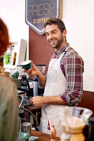 Photo for Happy man, barista and talking to customer in coffee shop with cup for order, service and catering. Person, client or patron in cafe for drink, tea or espresso with smile, chat and helping in Italy. - Royalty Free Image