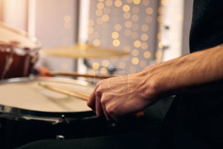 Photo for Man, hands and music with drums, instrument and festival with closeup, rock and roll with talent. Person, artist or guy with equipment, culture or concert with sound, entertainment or sticks with fun. - Royalty Free Image