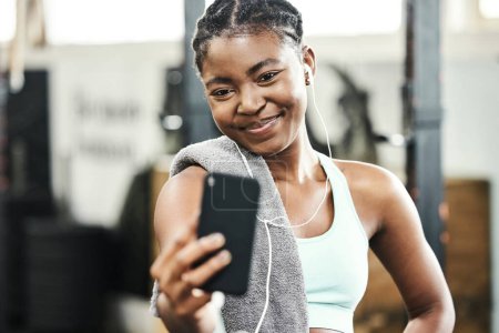 Photo for Gym, fitness or happy black woman in selfie on workout, exercise or training break for social media. Relax, sports or healthy African girl in photo for online profile picture with smile or wellness. - Royalty Free Image