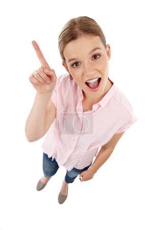 Photo for Surprise, woman and portrait pointing for promotion, advertising or marketing with mockup space from above angle on white background. Wow, gen z girl or hands to show logo, icon or in studio backdrop. - Royalty Free Image