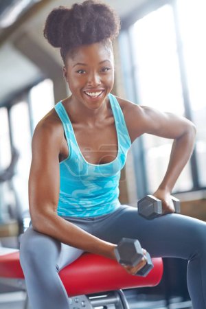 Photo for Black woman, weight lifting and portrait in gym for exercise with dumbbell, fitness challenge and strong muscle. Bodybuilder, happy and strength training with confidence, mockup and power workout. - Royalty Free Image