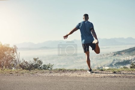 Photo for Black man, stretching and outdoor for exercise, running and fitness with nature for upcoming athletic competition. Athlete, warm up and road for workout, jog and training with mountain top view. - Royalty Free Image