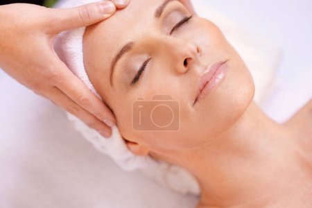 Photo for Woman, hands and facial massage for skincare detox in zen resort for stress relief vacation, wellbeing or spa. Female person, fingers and dermatology treatment for holiday wellness, peace or leisure. - Royalty Free Image