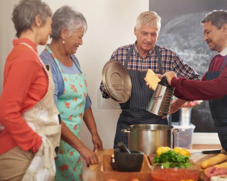 Téléchargez les photos : Cooking, dinner and mature people in kitchen learning recipe for healthy diet, nutrition and wellness. Culinary, retirement and men and women with ingredients, vegetables or food for supper together. - en image libre de droit