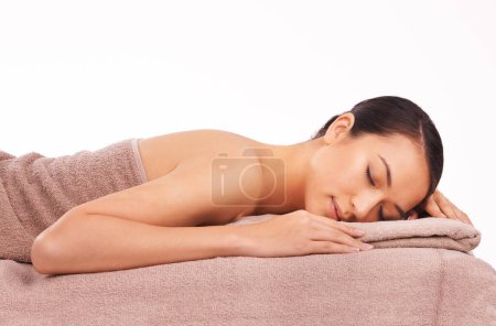 Photo for Spa, massage and peace with woman, wellness and person isolated on white studio background. Holiday, mockup space and model with vacation and calm with hospitality industry and zen with stress relief. - Royalty Free Image