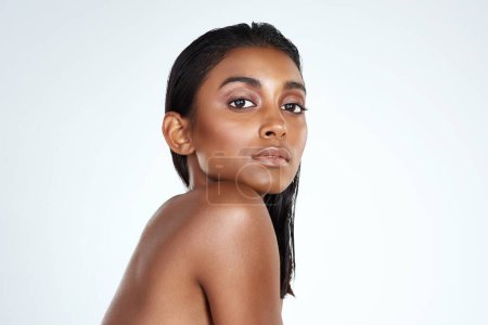 Photo for Studio, portrait and Indian woman with natural beauty from dermatology in mockup space. Healthy, skincare and girl with confidence from glow on face or pride from cosmetics in white background. - Royalty Free Image