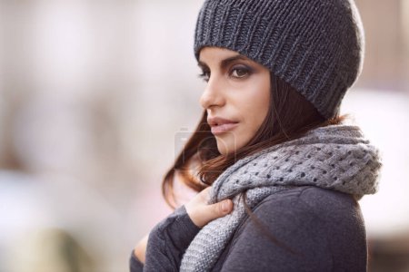 Photo for Woman, cozy and fashion with beanie, cold and winter for comfort and warm. Designer, gen z and urban with trendy, style and autumn jacket with knit scarf and attitude for cool weather and relaxation. - Royalty Free Image