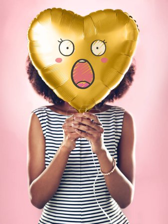 Photo for Woman, studio and wow on heart balloon for surprise on valentines day, isolated and pink background for love. Girl, amazement and shock for news, announcement and gift or present for special person - Royalty Free Image