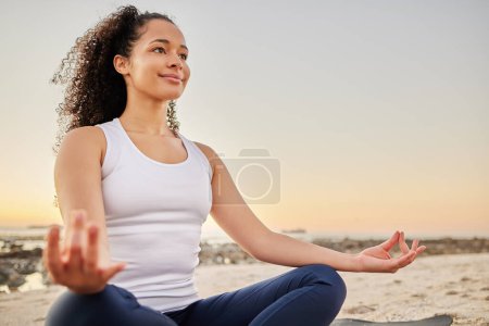 Photo for Woman, beach and smile with meditation for peace or zen, calm and wellbeing or wellness in Los Angeles. Female person, outdoor and mat for mental health, mindset and relaxation for stress relief - Royalty Free Image