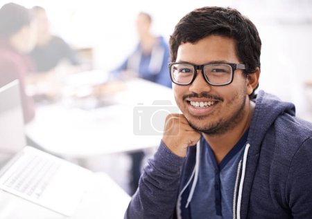 Photo for IT professional, smile and portrait in office with laptop for information technology innovation, web development and programming. Indian person or programmer with tech for database business software. - Royalty Free Image