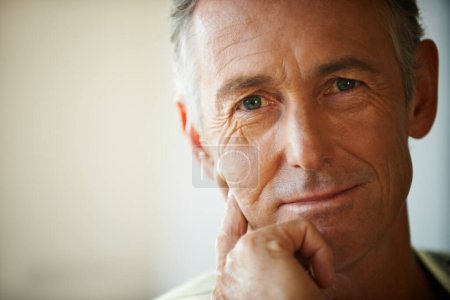 Photo for Headshot, senior man and portrait thinking about retirement at home, apartment and living room with mockup space. Hand, idea and mature male person in house to relax in lounge for elderly care. - Royalty Free Image