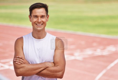 Photo for Athlete, portrait or positive for fitness on stadium, arms crossed or commitment to wellness as running professional. American, man or face for confident in sport, outdoor or training for health body. - Royalty Free Image