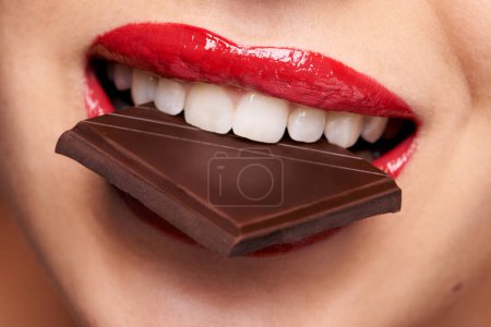 Photo for Chocolate bar, beauty and woman with red lips for lipstick cosmetics, makeup and skincare. Sweets, macro and female model person in cheat meal for cocoa product, unhealthy snack or eating candy. - Royalty Free Image