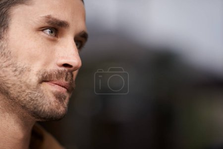 Photo for Outdoor, thinking and face of man with serious expression, confidence and adult pensive and wondering. Background, male person and guy with idea or plan in city of Madrid with mock up and space. - Royalty Free Image