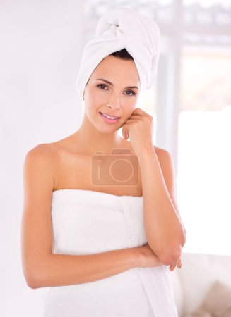 Photo for Portrait, beauty and woman with smile in bathroom for routine in morning with aesthetic for cosmetics. Happiness, female person and girl with results on face from treatment with towel abd soft skin. - Royalty Free Image