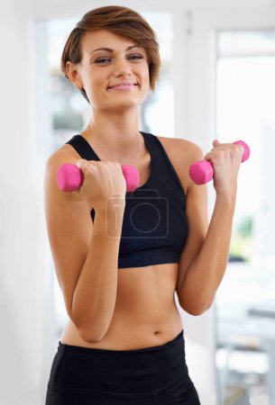 Photo for Home workout, portrait or happy woman with fitness, dumbbells or power for strength training or exercise. Gym studio, sports athlete or female person with weights, smile or strong arms for health. - Royalty Free Image