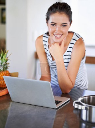 Photo for Kitchen, portrait and woman search with laptop for cooking, recipe and tutorial guide for dinner. Happy, chef and girl typing on computer and learning from blog about nutrition, diet and information. - Royalty Free Image