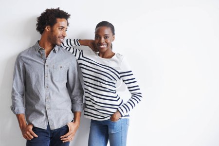 Photo for Couple, smile and portrait by white wall in fashion with confidence, casual style and model aesthetic. Black woman, and face of man with trendy apparel, edgy clothes and pride with support and relax. - Royalty Free Image