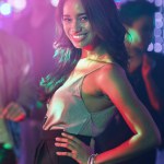 Woman, portrait and confident in nightclub for new years eve, birthday and party or disco in Mexico. Smile, dancer and fashion in festival for concert, dancing and celebration on dance floor in city.