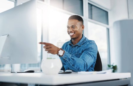 Photo for Happy, pointing and black man by computer in office, workspace and desk confident in creative career. professional, internship and journalist with technology for typing, research and internet. - Royalty Free Image