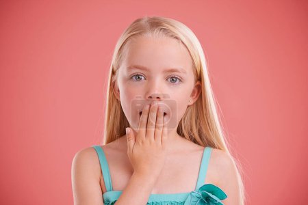Photo for Wow, surprise and portrait of girl in studio with hand on mouth for secret, gossip or news on pink background. Omg, face and kid model with oops emoji, shock or announcement, promo or unexpected info. - Royalty Free Image