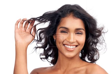 Photo for Hair, studio and portrait of indian woman with makeup with self care from cosmetics in white background. Beauty, skincare and happy model with healthy glow on skin or natural hairstyle mockup. - Royalty Free Image