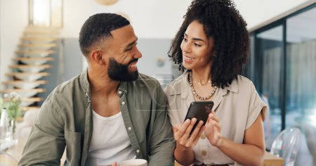 Photo for Man, woman and smartphone on sofa in living room for social media, help or assistance of app. Couple, bonding and technology with smile for happy explanation, blog or website at home together. - Royalty Free Image