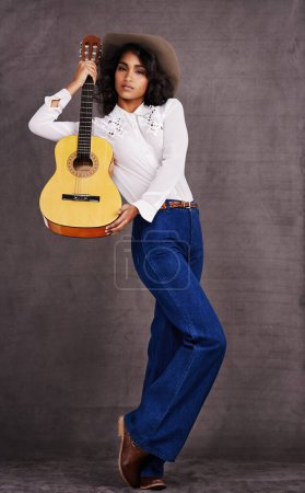 Photo for Woman, fashion and portrait with guitar for instrument, musician and music for string and note for western and melody. Young person or artist for creative, listen and sound for song and acoustic. - Royalty Free Image
