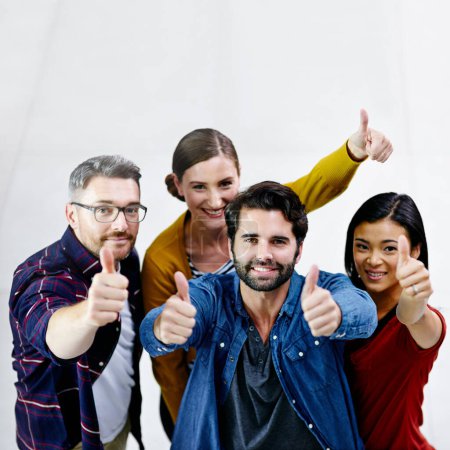 Photo for Portrait, happy team and thumbs up with achievement for success, celebrate goals and agreement for mockup. Employee group, winner and yes emoji for good job, thank you and creative career with space. - Royalty Free Image