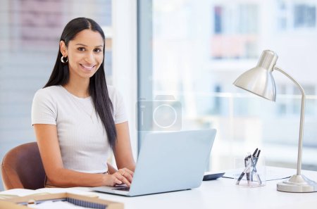 Photo for Indian woman, portrait and laptop in office as creative or web design, project planning or agency. Female person, face and smile with market research for graphic company, digital artist or online. - Royalty Free Image