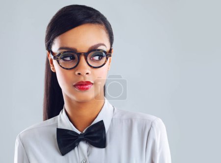 Photo for Student, doubt and thinking in studio confused with fashion of nerd or geek on background, mockup or space. Question, why and frustrated girl problem solving with glasses in college or academy. - Royalty Free Image