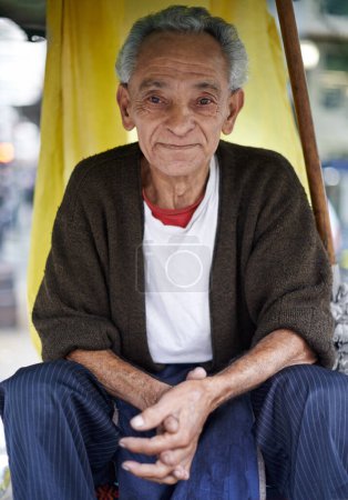 Photo for Relax, outdoor and portrait of an old man in a city for peace in retirement, neighborhood or chair. Sao Paulo, resting and elderly male person in street with poverty, hardship and wisdom in Brazil. - Royalty Free Image