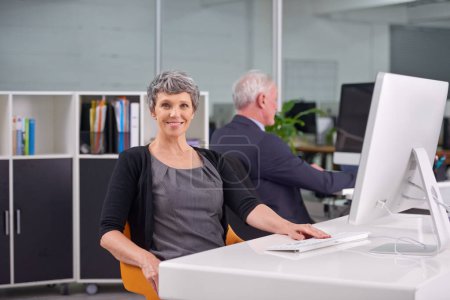 Photo for Woman, computer and portrait in office for online, career and profession for research and corporate. Mature person or HR manager and happy with tech for recruitment, website and business for work. - Royalty Free Image