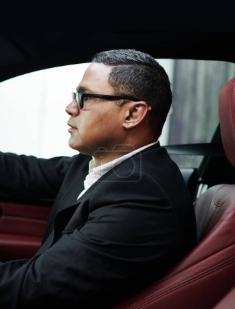 Photo for Profile, gentleman and entrepreneur in a luxury car, rich person and wealthy with morning commute and travel. Transportation, business and glasses with success and corporate professional with vehicle. - Royalty Free Image